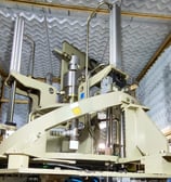 a machine that is making a paper bag