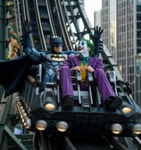 batman and joker on a roller coster