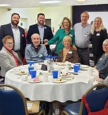 People gathered around the table at the Crescent Hills Civic Association's annual MLK luncheon