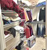 a closet with a closet space for clothes and other items