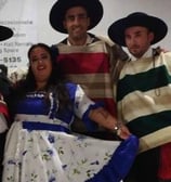 a group of people dressed in Chilean - style costumes