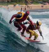 deadpool and wolverine surfing