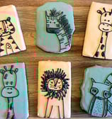 Simply adorable cookies for a kid's birthday party. Cartoon animals on light backgrounds