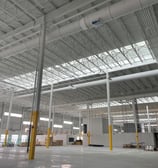 a large warehouse with a lot of pipes and pipes