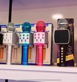 a shelf of microphones and microphones on a shelf