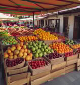 a bunch of fruit and vegetables on display in a small farmers. market