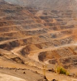 a large open pit hole in a large open pit