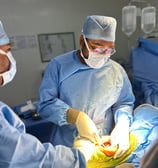 Surgeon Dr Vijay Chandar performing minimally invasive Total knee replacement on a patient's knee