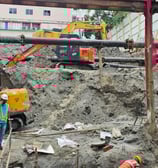 a group of construction workers working on a construction site