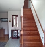 beautiful wooden foyer stairs