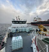 a large container of water on a boat