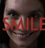 lady wit creepy smile with the word smile written across her face