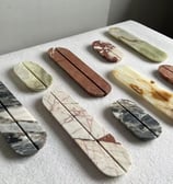a variety of marbled stoneware pieces of marble