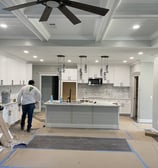 Interior kitchen remodeling project by Garnet Painting — luxury cabinetry, lighting, and ceiling work in Georgia