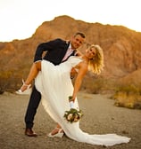 a man and woman are posing for a picture