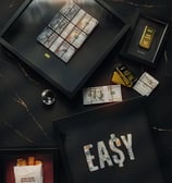 frames with money and gold bars in a marble background