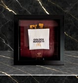a picture of a golden nuggets in a motivational frame