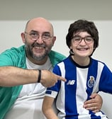 a man and a boy sitting on a couch