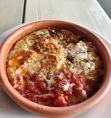 Eggs with sausage & cheese in the oven , at Sunset Drift tavern in Ksamil