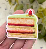 Vinyl sticker featuring a piece of cake