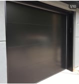 flush black smooth garage door design