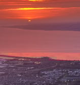 Sunrise over Belfast lough taken from the top of the cave hill Belfast Northern Ireland