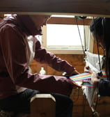 weaving in a Tibetan village