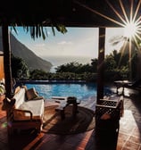 Discover Ladera Resort in Saint Lucia, an eco-luxury retreat nestled between the Pitons. Experience 
