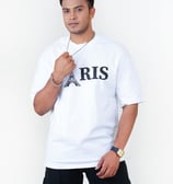 a man in a white shirt and black pants
