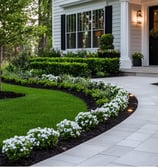 A paver path to the front house with decoration both sides