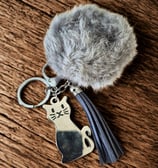 a cat keychain with a cat on it