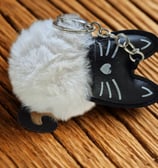 a cat keychain with a cat keychain