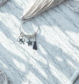 a keychain with a starfish charm on it