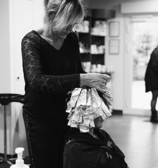 a woman getting her hair cut by a hairdresser