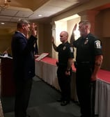 Mayor Holmes swears in two new officers