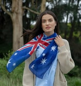 A photo of a woman wearing a digital printed Australian flag chiffon scarf