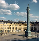 a tall tower with a clock on top of it