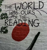a wall mural of a book with a red sun in the background