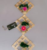 "Handmade recycled house model crafted from eco-friendly materials"