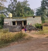 boys stand with cycle front of anganwadi kendar