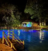a pool with a gazeboar and a gazeboar