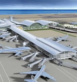 a large airport terminal with a lot of airplanes