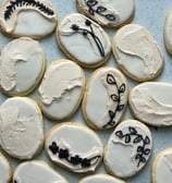 Chic wedding sugar cookies for guests to eat individually. Large quantities made for the event