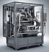 a person holding a remote control in their hand