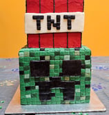 a minecraft creeper and TNT Cakes