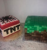 A Minecraft Cake with TNT and Grass Block