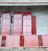 a red door with red shutter shutters and shutter shutters