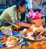 bali food tour: at night market a food vendor