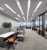 A woman sitting at a table with a tray of food