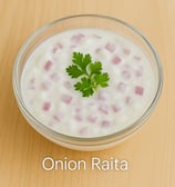 a bowl of soup with onions and onion